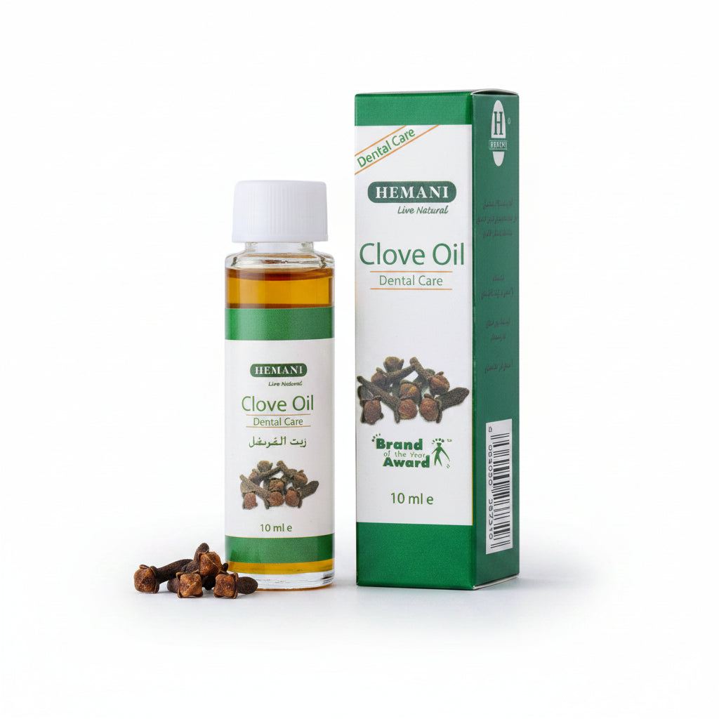 Hemani Clove Oil bottle and packaging on a white background