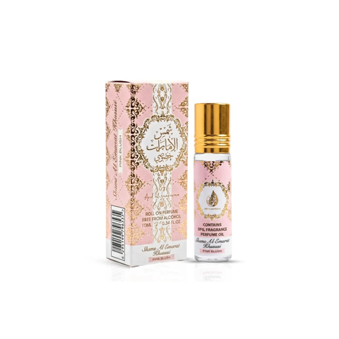 A bottle of Jasmine Al Ghafliya Concentrate Perfume Sol on Alcohol next to its pink and gold ornate packaging box, set against a plain white background.Shams Al Emarat Khususi Pink Blush Perfume Oil 10ml – Ard Al Zaafaran