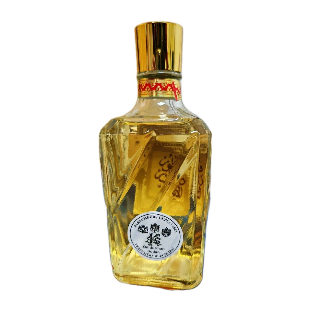 A faceted glass bottle of Chinese baijiu liquor with a shiny gold cap and a round white label reading 'Premium & Deposit'. The bottle is filled with golden liquid and is photographed against a plain white background.