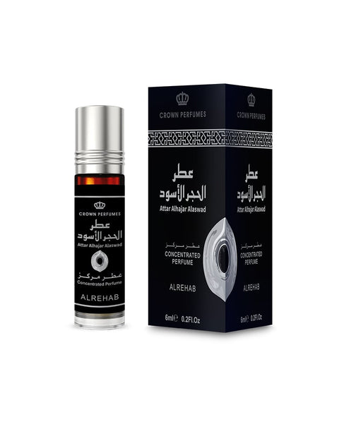 A bottle of Crown Perfumes Attar Al-Khaji Al-Mershed concentrated perfume next to its black packaging box, featuring Arabic and English text and a silver atomizer Hajar al-Aswad Perfume Oil 6ml – Al Rehabgraphic.