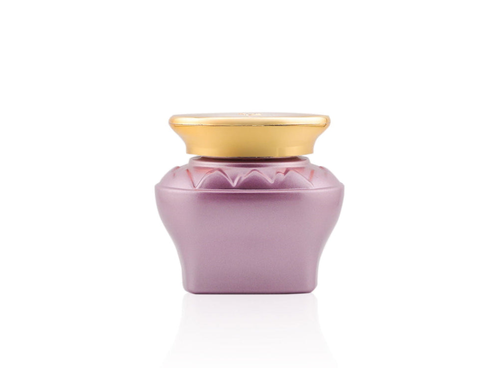 Purple container with gold lid on a white background Maamul Haneen Oud Muattar Bakhoor 48g – Khadlaj