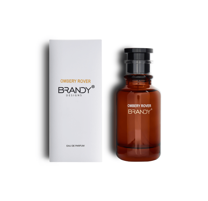 Brown perfume bottle and white box with 'Ombrey Rover Brandy' branding on a white background