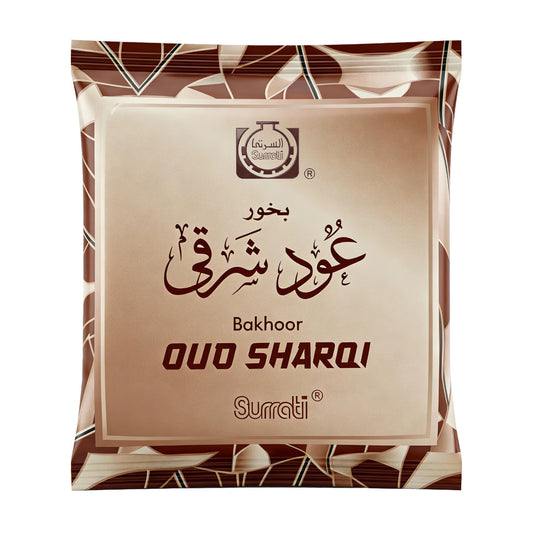 A sealed pouch of Surrati Bakhoor Ouo Sharqi incense sticks, featuring a metallic bronze and beige design with Arabic calligraphy and the brand logo.