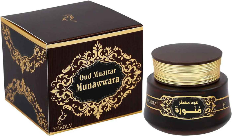 Khadlaj Oud Muattar Munawwara perfume set, featuring a dark brown and gold ornate box alongside a matching dark brown and gold jar with Arabic lettering on the label.Oud Muattar Munawwara Bakhoor 35g – Khadlaj