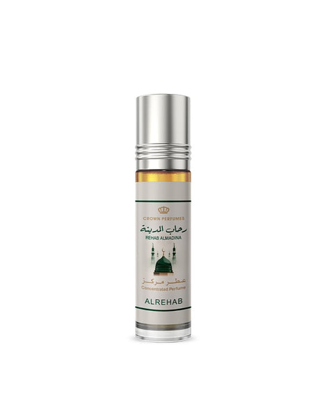 A roll-on perfume bottle with a silver cap and a white label featuring green and gold details, labeled 'Al Rehab' by Crown Perfumes, on a plain white background.Rehab Almadina Perfume Oil 6ml – Al Rehab