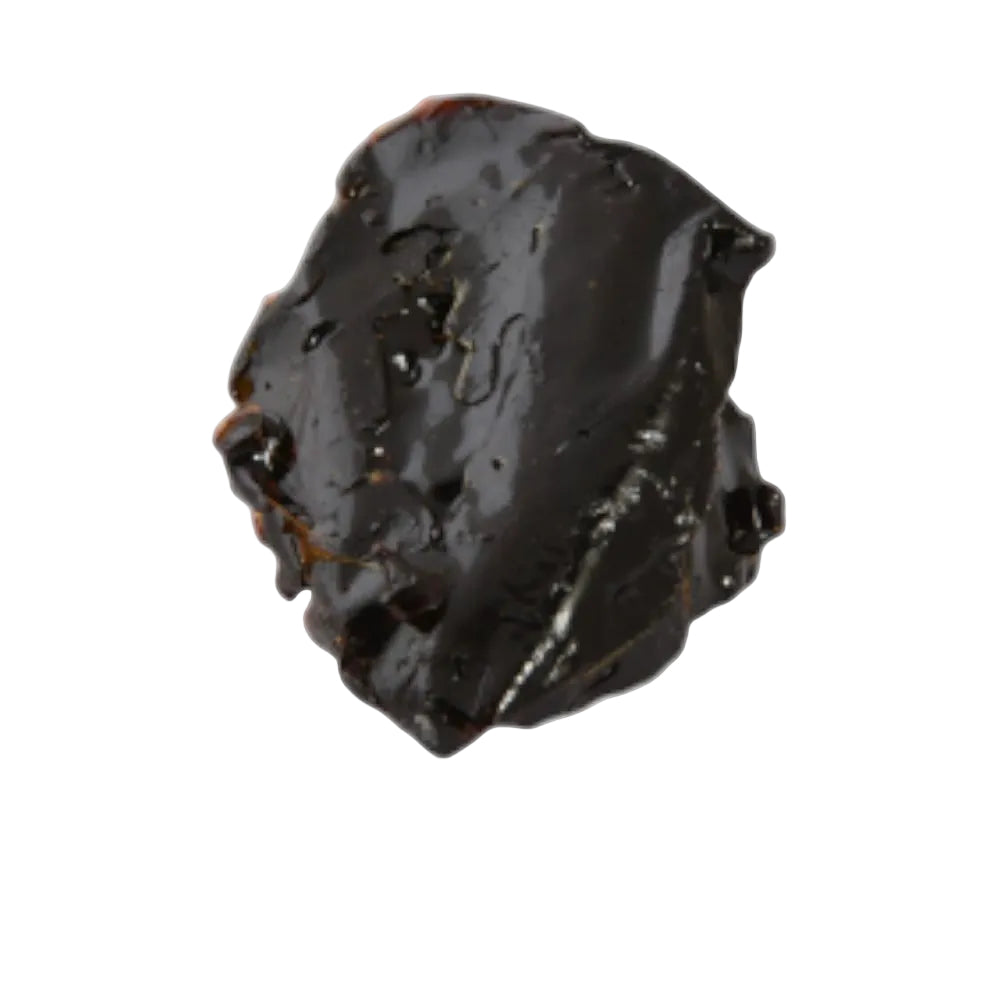 A single irregular dark brown to near-black solid item with a glossy, slightly cracked surface, centered on a white background with faint decorative shapes and small contact/logo text in the lower left. Socotri Sabir (Hadhrami Sabir) الصبر السقطري