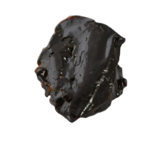 A single irregular dark brown to near-black solid item with a glossy, slightly cracked surface, centered on a white background with faint decorative shapes and small contact/logo text in the lower left. Socotri Sabir (Hadhrami Sabir) الصبر السقطري