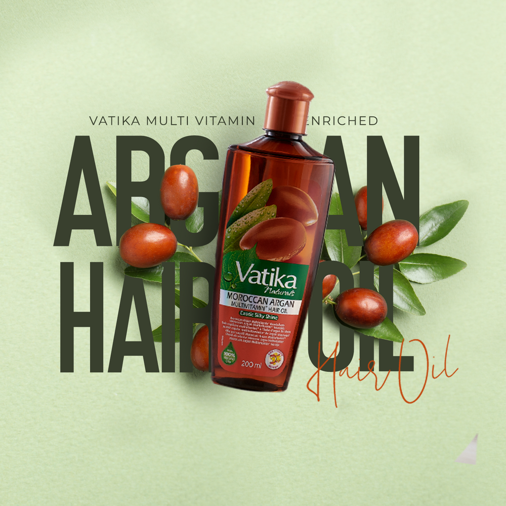 A bottle of Vatika Moroccan Argan Hair Oil is centered against a light sage green background, surrounded by argan nuts, leaves, and large dark text. The product bottle is amber-brown with a red cap and a green-and-white label.