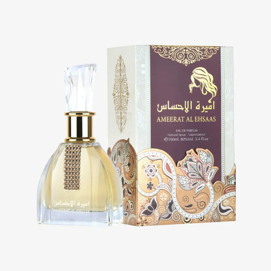 Perfume bottle and packaging of Ameerat Al Ehsaas on a white background