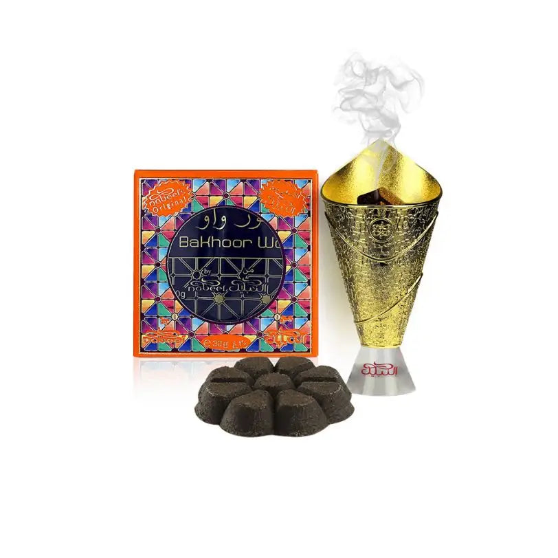 Golden incense burner with intricate embossed patterns and silver base emitting smoke for nabeel bakhoor wow oud incense