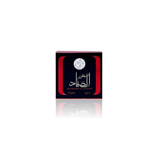 Black and red square box of bukhoor al sayaad 40g perfume by ard al zaafaran featuring silver arabic script and emblem