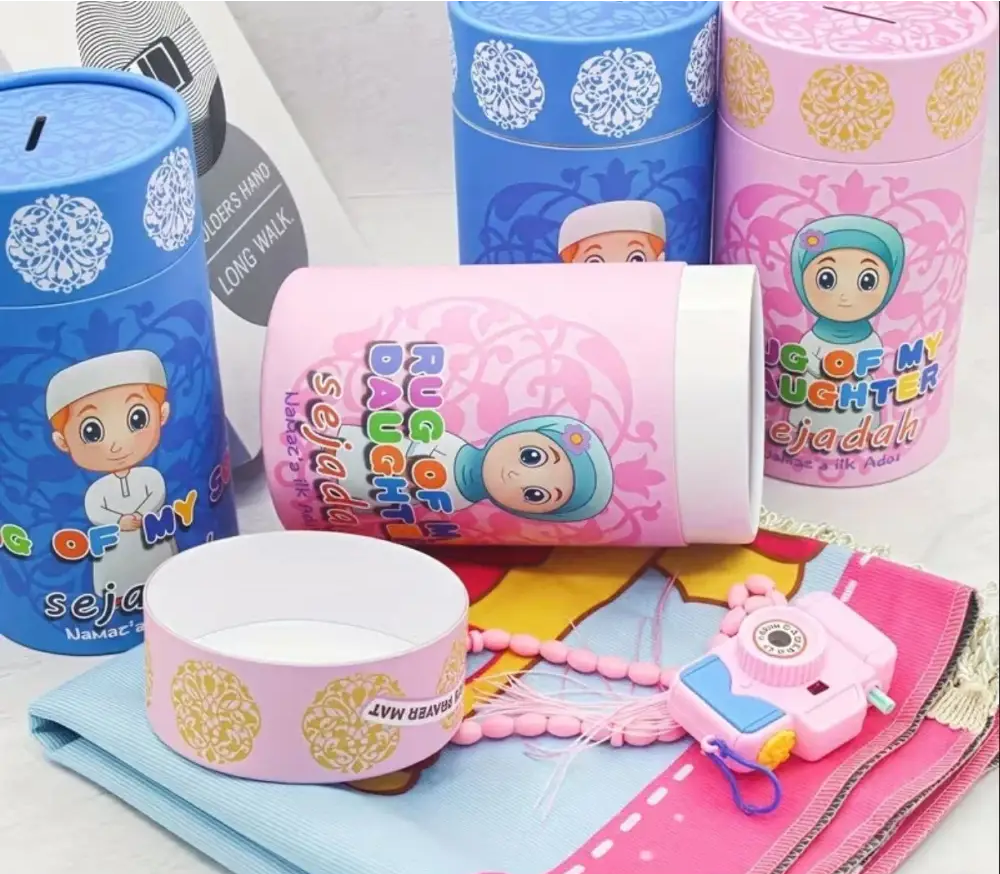 Pink cylindrical storage jar with girl in blue headscarf and sugar of my daughter text for small prayer mat set