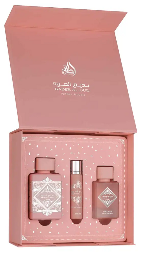 Babyl Al Oud perfume set with three bottles in a pink box on a white background