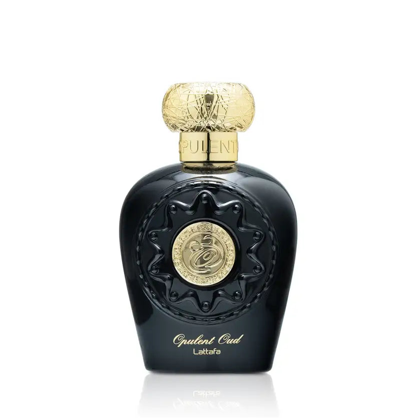 Black and gold perfume bottle on a white background