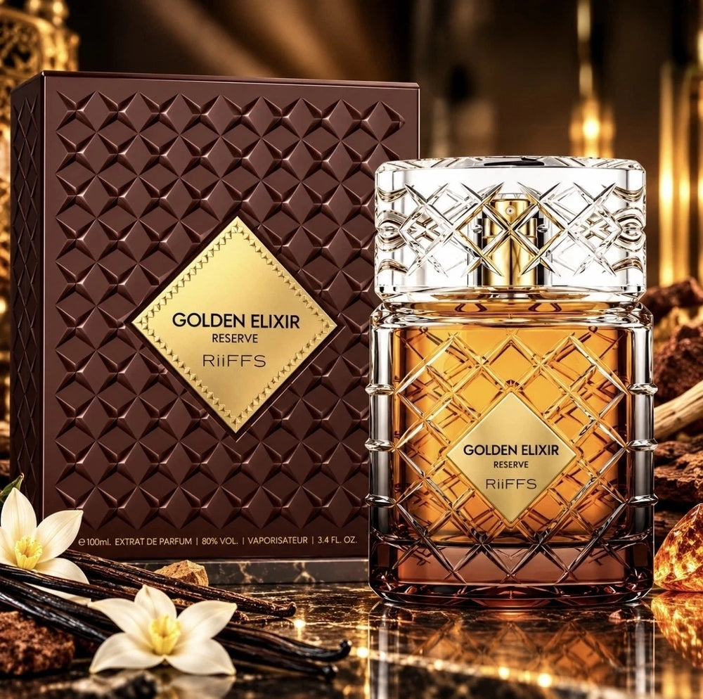 Golden Elixir Reserve by Ruffs perfume bottle with a textured faceted cap and amber liquid, shown next to its dark brown box with a gold diamond label. The bottle and box are set on a reflective dark surface with vanilla beans and white flowers in a warm, luxurious setting.Golden Elixir Reserve Extrait de Parfum 100ml – Riiffs