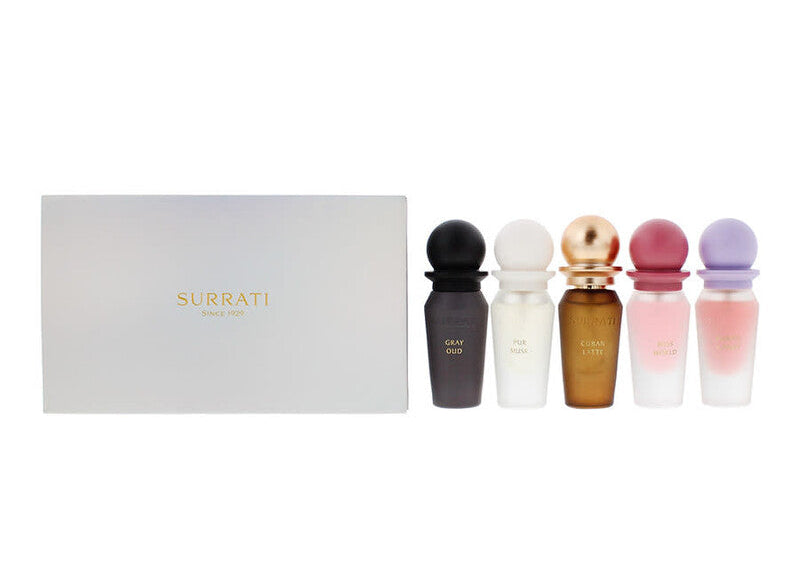 Surrati Since 1947 fragrance gift set featuring a white box with gold lettering and five small perfume bottles in black, white, amber, pink, and lavender gradient colors on a white background. Surrati Mini Collection 2 -5X10ml EDP-S Gift Set