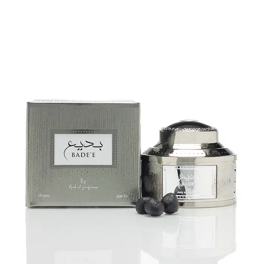 Bade'e by Ard Al Zaafaran candle with packaging on a white background