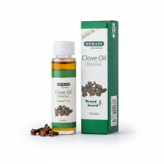 Hemani Clove Oil bottle and packaging on a white background