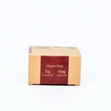 Box of Aleppo Soap with laurel and olive oil percentages on a white background