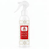 A white spray bottle of Waww White Musk room fragrance, featuring a white trigger spray top, a red and white label, and a gold floral pattern on the bottle body.