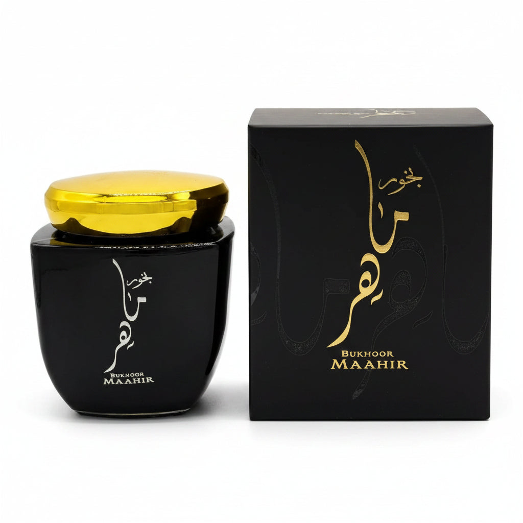 Black container with gold lid and 'Bukhoor Maahir' packaging on a white background