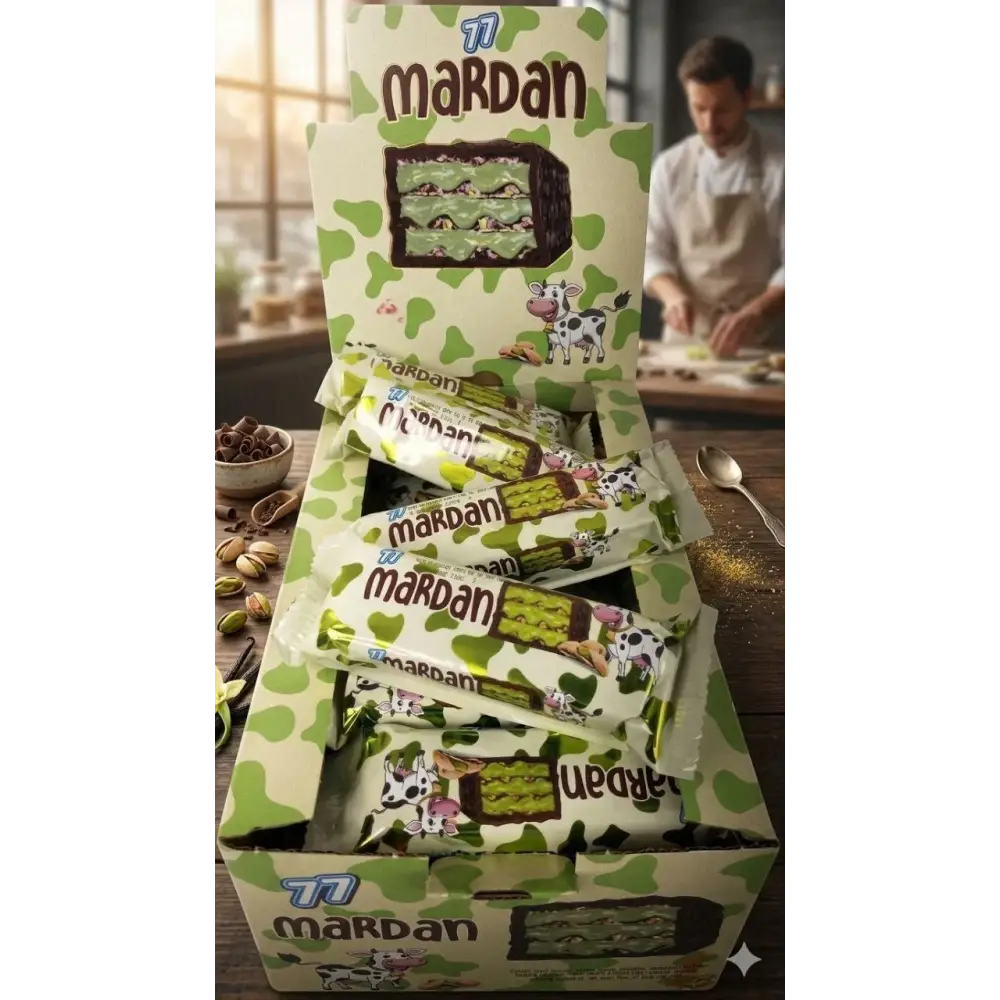 Green and white cow print wrapped mardan pistachio cream wafer bars in a matching box of 24 pistachio cream bars