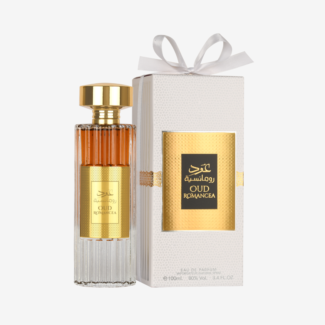 Perfume bottle with gold cap and label, accompanied by a matching white box on a white background