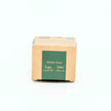 Bar of Aleppo Soap with cardboard packaging on a white background