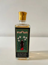 A rectangular glass bottle of El Bint El Sudan perfume with a shiny gold cap and a detailed black label featuring a gothic figure and stars, set against a p Bint El Sudan – Chypre EDT 100mllain light background.