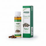Hemani Clove Oil bottle and packaging on a white background