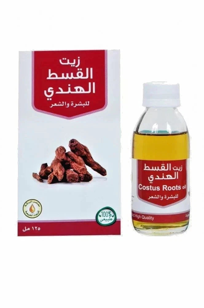 Bottle and box of Costus Roots oil with Arabic text on a white background