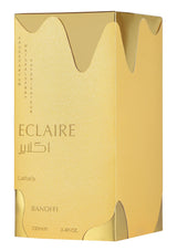 Gold Eclaire perfume box with branding on a white background
