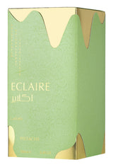 Green perfume box with gold accents and 'Eclaire' branding on a white background