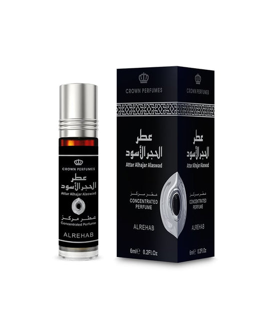 A bottle of Crown Perfumes Attar Al-Khaji Al-Mershed concentrated perfume next to its black packaging box, featuring Arabic and English text and a silver atomizer Hajar al-Aswad Perfume Oil 6ml – Al Rehabgraphic.