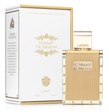 Lattafa The Kingdom perfume bottle and packaging on a white background