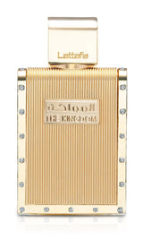 Gold Lettafa perfume bottle with decorative elements on a white background