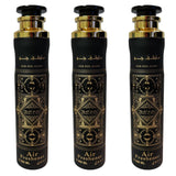 Three black cylindrical air freshener bottles with gold caps and intricate gold geometric patterns, labeled 'OUD FOR GLORY' and 'Air Freshener', shown on a white background.Lattafa Bade'e Al Oud Room Spray 300ml