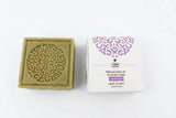 Bar of soap with decorative packaging on a white background
