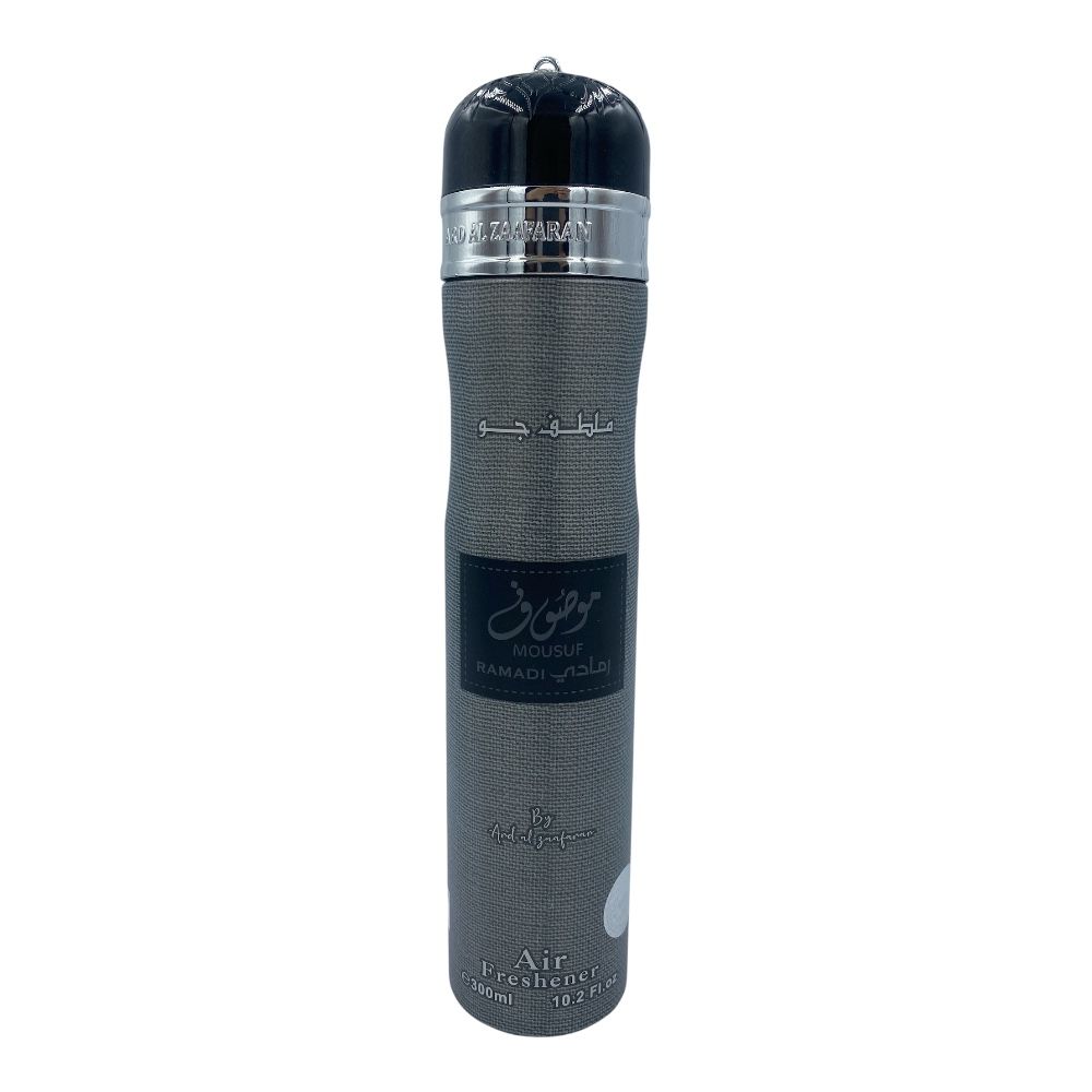 A tall cylindrical perfume bottle with a textured dark gray body, a black cap, and silver metallic accents. The label features Arabic calligraphy and the brand name 'Royal Zahran'. Mousuf Ramadi 300ml Air Freshener – Ard Al Zaafaran
