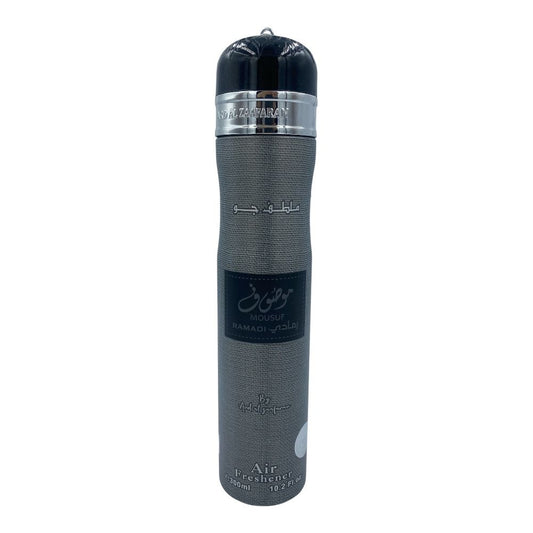 A tall cylindrical perfume bottle with a textured dark gray body, a black cap, and silver metallic accents. The label features Arabic calligraphy and the brand name 'Royal Zahran'. Mousuf Ramadi 300ml Air Freshener – Ard Al Zaafaran