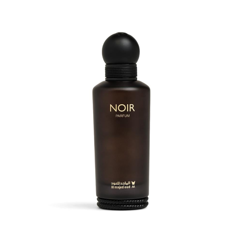 A dark brown glass perfume bottle with a matte black spherical cap, featuring the text 'NOIR PARFUM' in gold on the front, set against a plain white background.Noir – Woody Fruity EDP 150ml – Al Majed Oud