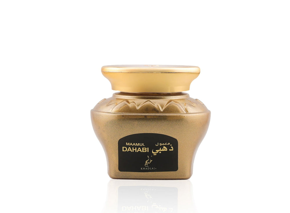 Gold container with a black label on a white background Maamul Dahabi Oud Muattar Bakhoor – Khadlaj