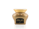 Gold container with a black label on a white background Maamul Dahabi Oud Muattar Bakhoor – Khadlaj