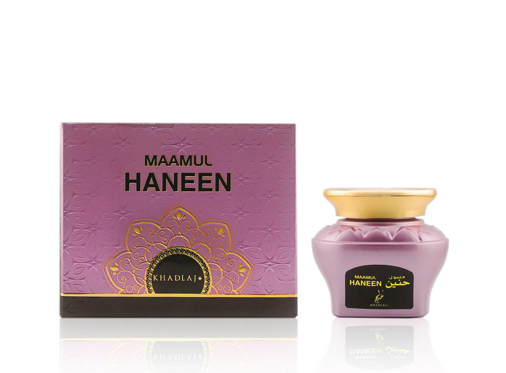 Maamul Haneen perfume bottle and packaging on a white background Maamul Haneen Oud Muattar Bakhoor 48g – Khadlaj