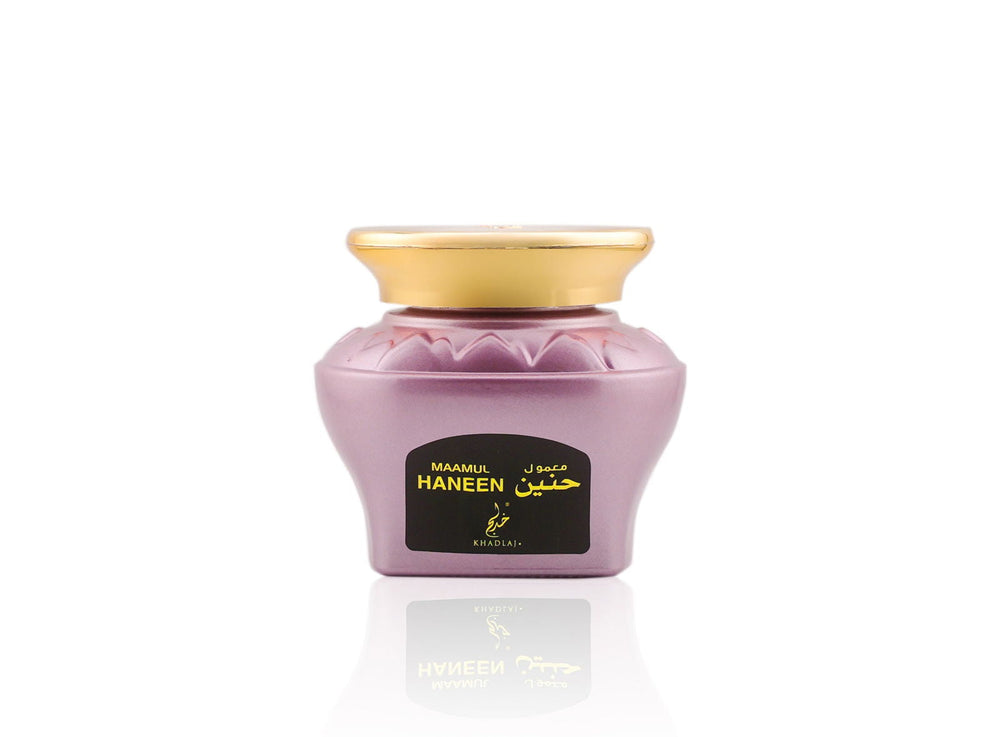 Purple jar with gold lid on a white background Maamul Haneen Oud Muattar Bakhoor 48g – Khadlaj