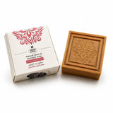 Bar of soap with decorative packaging on a white background
