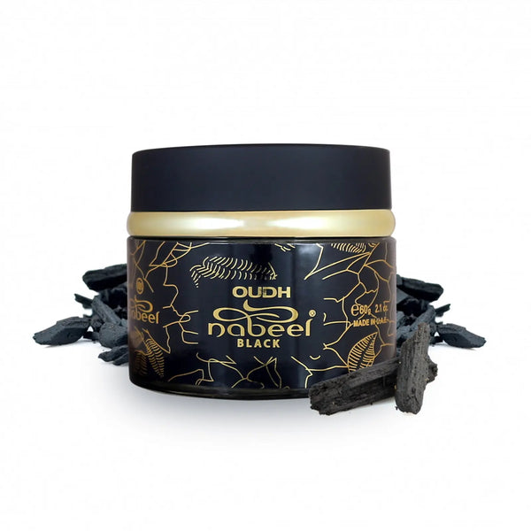 Black and gold container of Oudh Nabeel Black with incense sticks on a white background  Nabeel Black Bakhoor 60g – Premium Arabian Incense