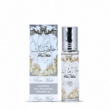 Perfume bottle and packaging with decorative design on a white background