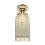 A bottle of Queen Eau de Parfum with a pale pearlescent greenish-gold body, a metallic gold cap, and gold lettering on a white background. Queen – Floral Amber EDP 100ml – Dkhoon EmiratesQueen – Floral Amber EDP 100ml – Dkhoon Emirates
