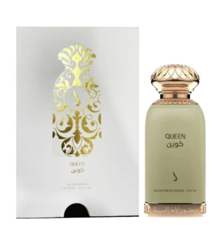 A bottle of Queen Kouin perfume next to its white and gold outer packaging box, set against a plain white Queen Perfume 100ml EDP Dkhoon Emirates
